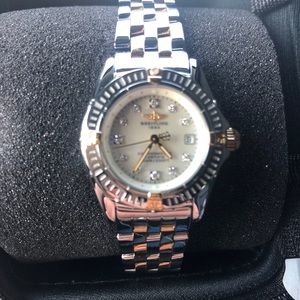 Breitling Women’s watch.Diamond face  silver/gold